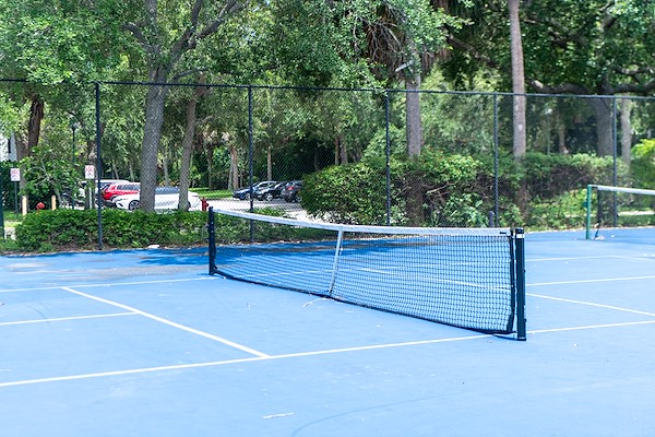 Tennis court at the Crimson Waters residence